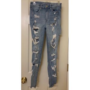 High Rise super stretch x distress denim